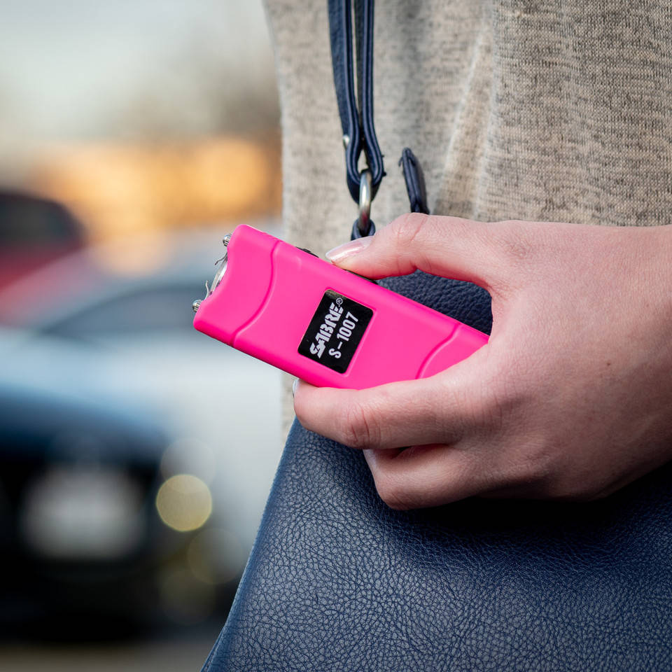 Sabre Red Rechargeable Flashlight With Stun Gun 3.8 M V 120 lm