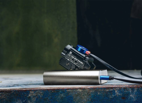 Olight - Latarka taktyczna LED na broń z celownikiem laserowym BALDR RL MINI - 600 lumenów - Czarna