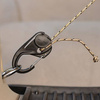 Nite Ize - Regulowana klamra biwakowa CamJam® Cord Tightener - Czarny - NCJ-01-R3