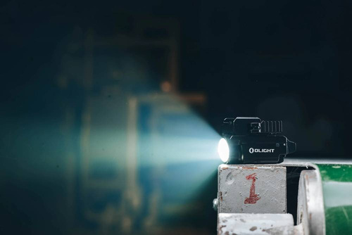 Olight - Latarka taktyczna LED na broń z celownikiem laserowym BALDR RL MINI - 600 lumenów - Czarna